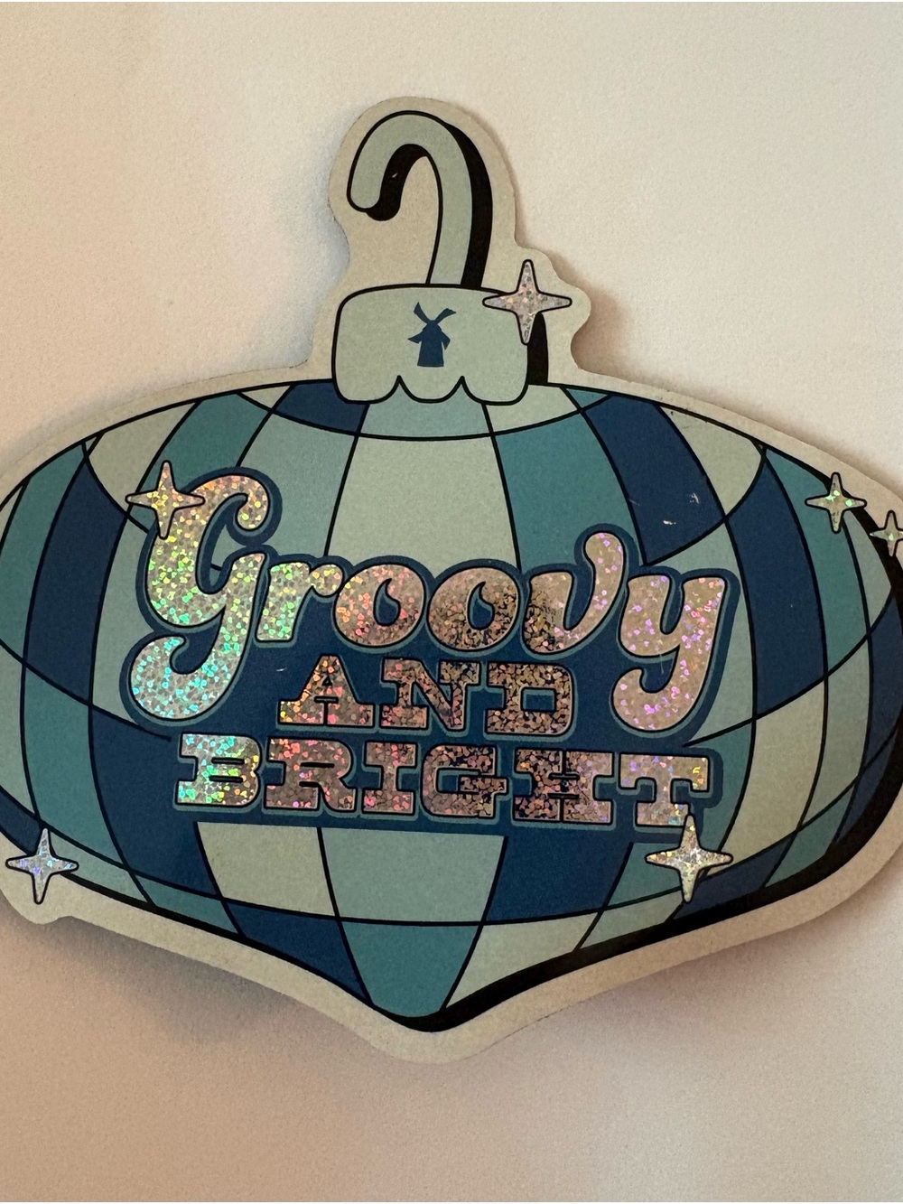 “Groovy and Bright” Blue Holographic Dutch Bros 2024 Holiday Ornament Sticker